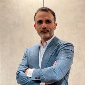 Amir Mashkoor headshot